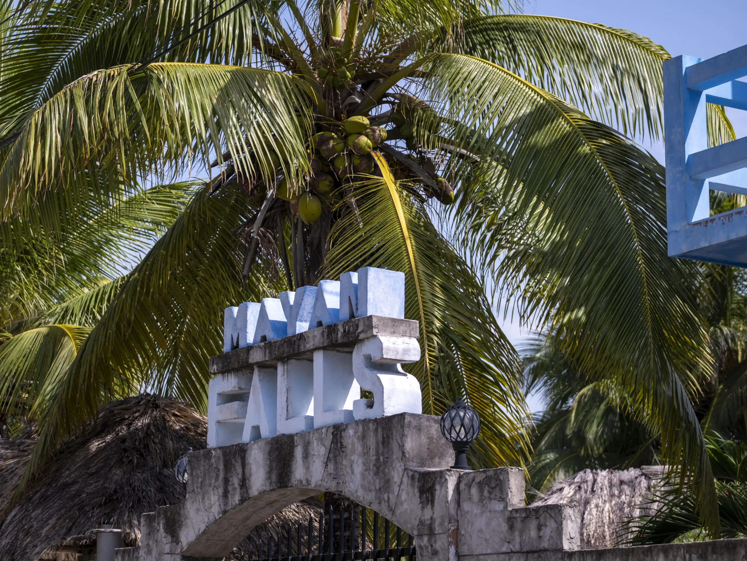 Image of the Mayan Falls sign above the Main Gate