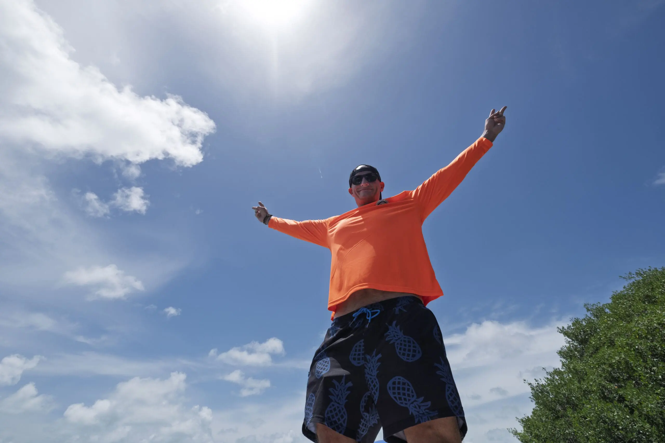 Man with arms wide